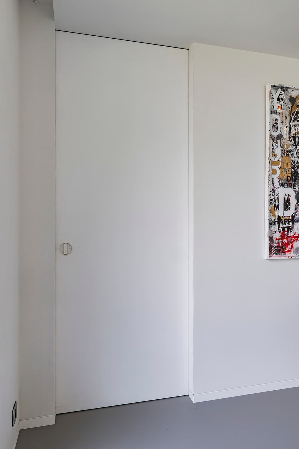 sliding pocket door in a minimalist interior