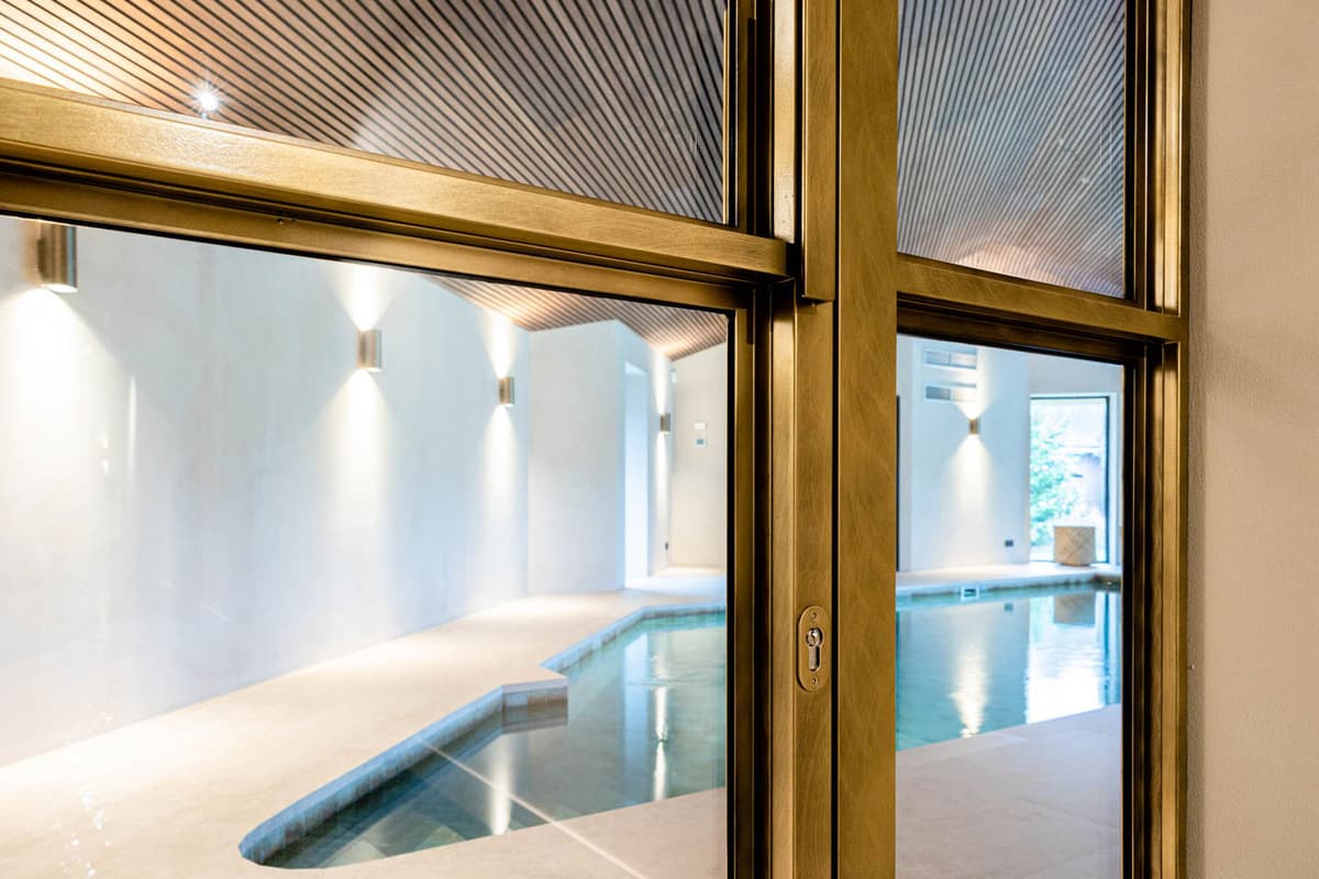 Specifying a steel door for an indoor pool, sauna, or spa