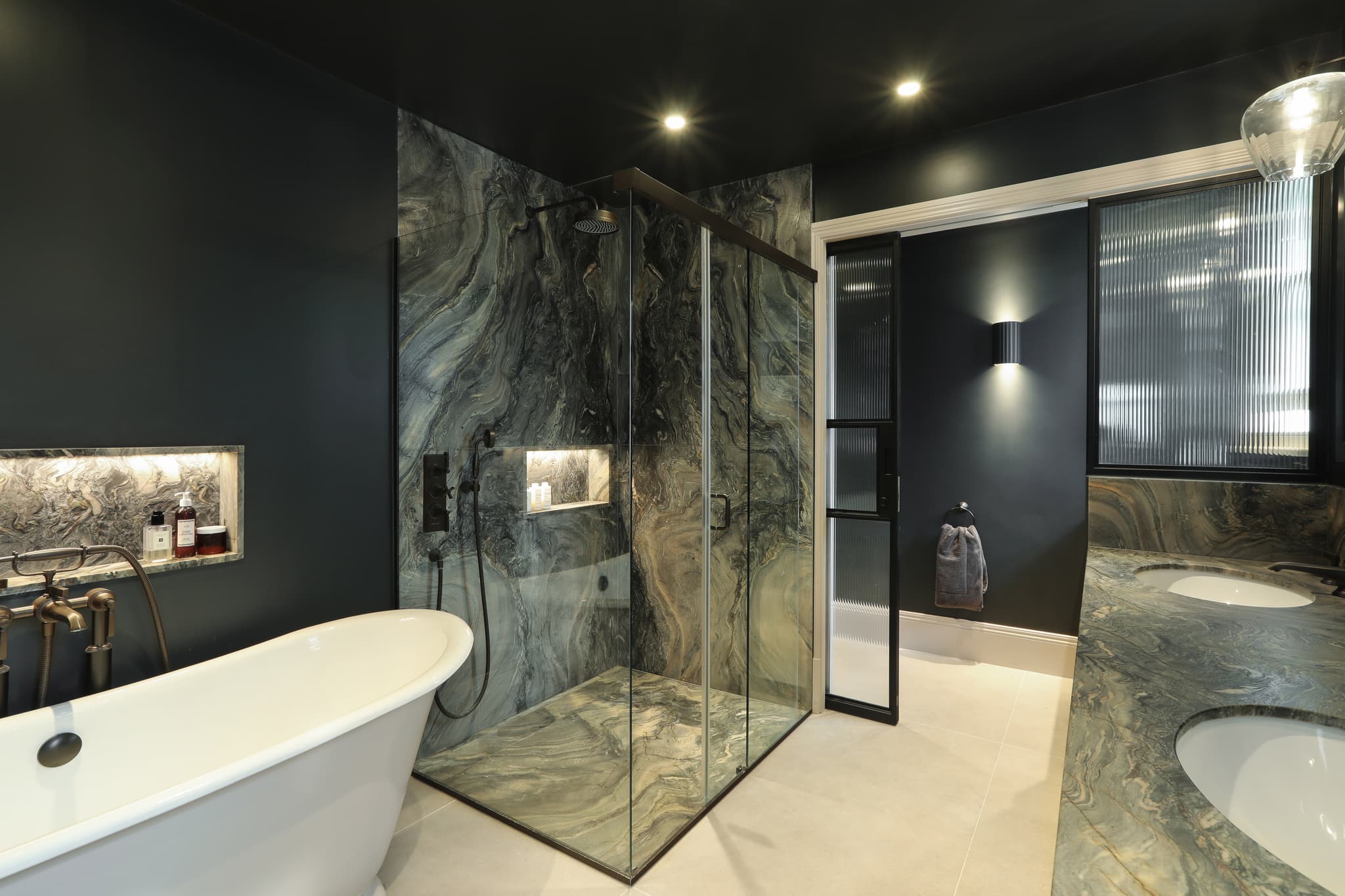 sliding steel glazed doors in a bathroom