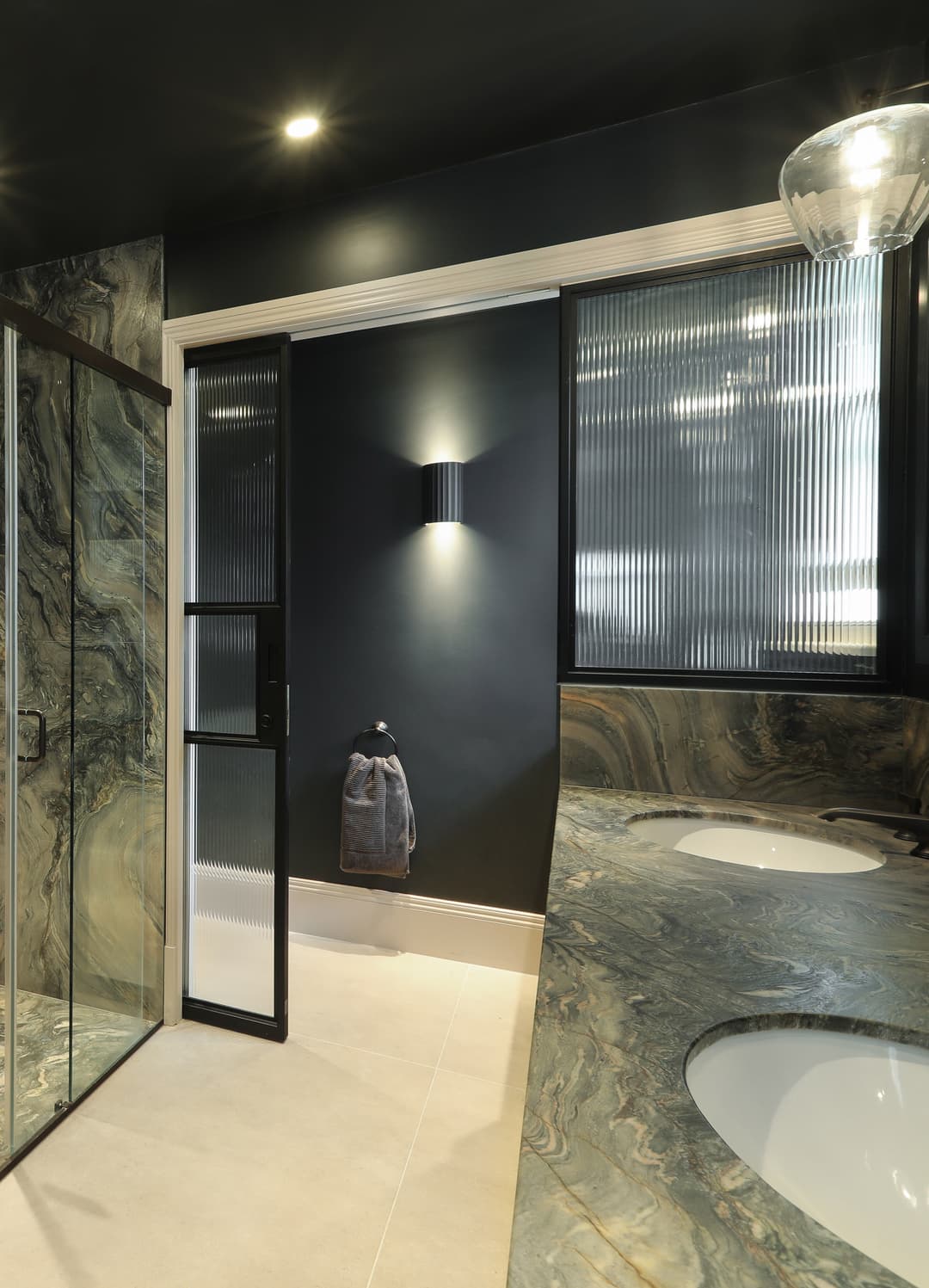 sliding steel glazed doors in a bathroom