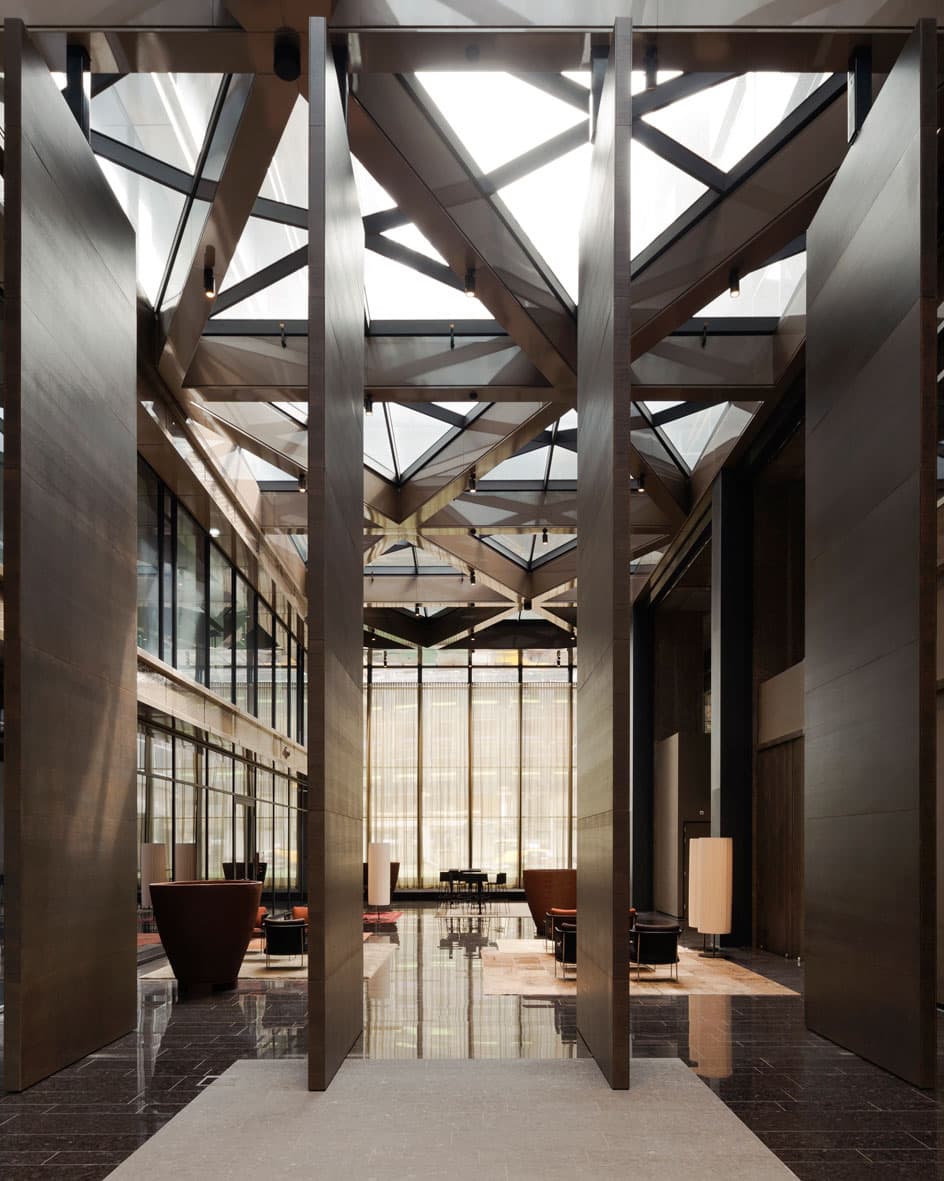 pivoting wall in an office building atrium using the FritsJurgens System 3 pivot